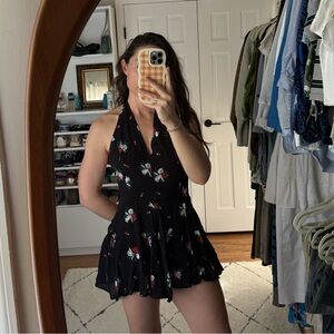 Free People Smooth Talker black floral romper size 4